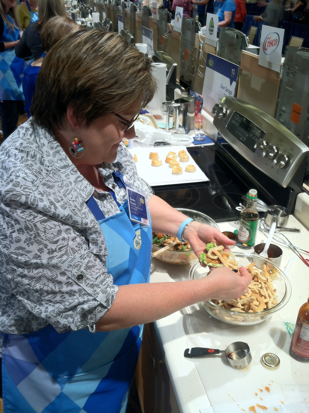  Denise Pounds is preparing one of her yummy Chicken Lettuce Wraps with Sesame Crescent Noodles for me to taste!  Lucky Me!! 