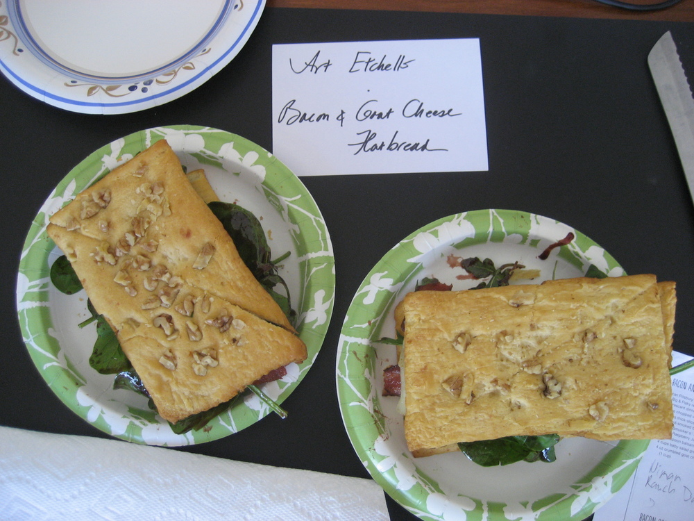  Art Etchells, Editor,  Foobooz.com , made Frances Pietsch's   Bacon and Goat Cheese Salad on Walnut Flatbread  .  Yum!  Love at first bite!  This sandwich had great flavor balance and texture!  i would like another bite right now please! 