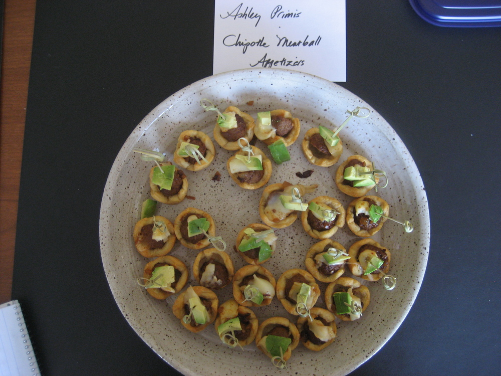  Brand Editor, Ashley Primis, made Carolyn Westerback's adorable   Chipotle Meatball Appetizers  .  Each bite of these meatball cups was packed with tons of flavor.  I loved how the avocado pieces cooled the spicy bite of the chipotle sauce.  These would be perfect to serve at your game day party!  