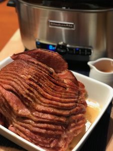 Spiral sliced ham cooked in slow cooker, then broiled.