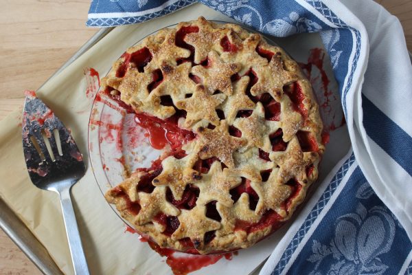 Strawberry Rhubarb Pie with Star Crust, slice cut out