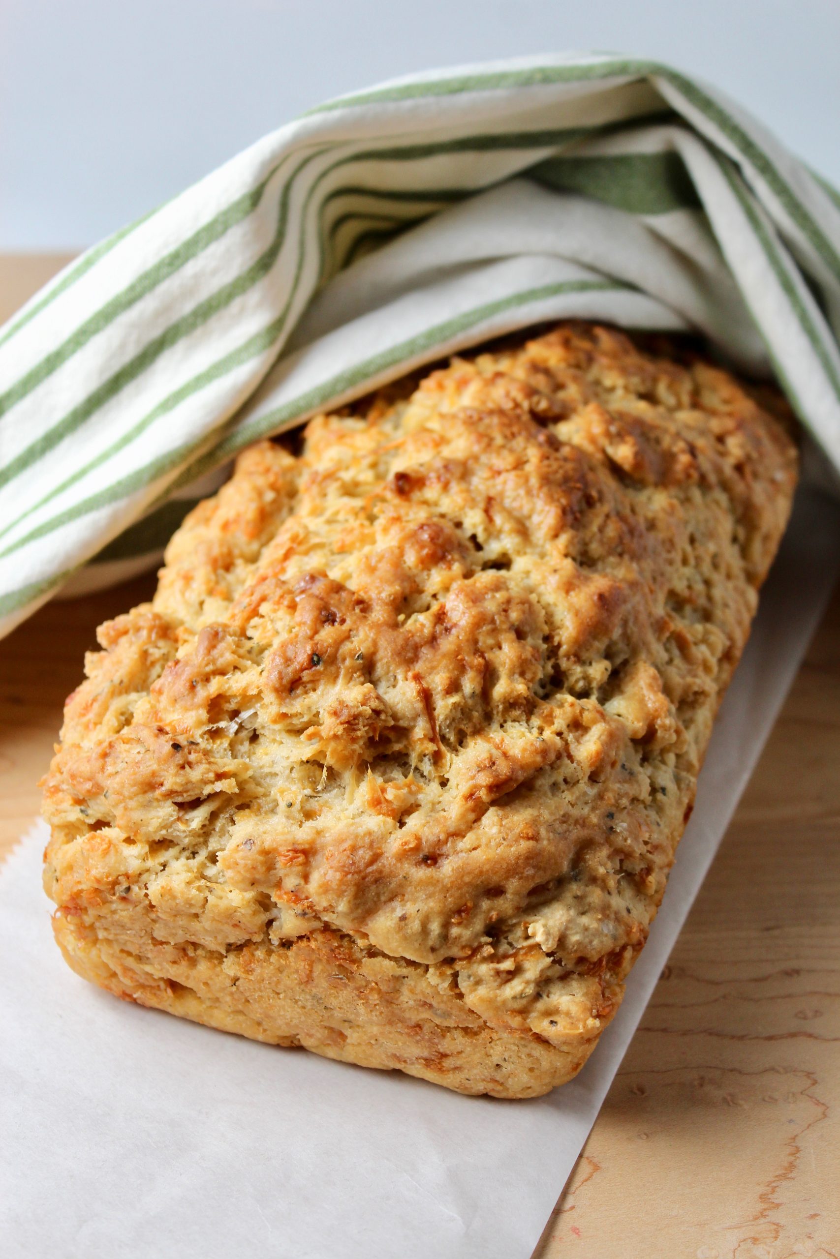 https://www.epicuricloud.com/wp-content/uploads/2020/03/Cheesy-Herb-Beer-Bread-Portrait-scaled.jpg