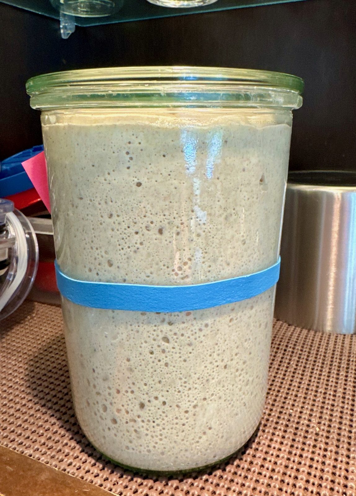 Weck jar full of active sourdough starter.