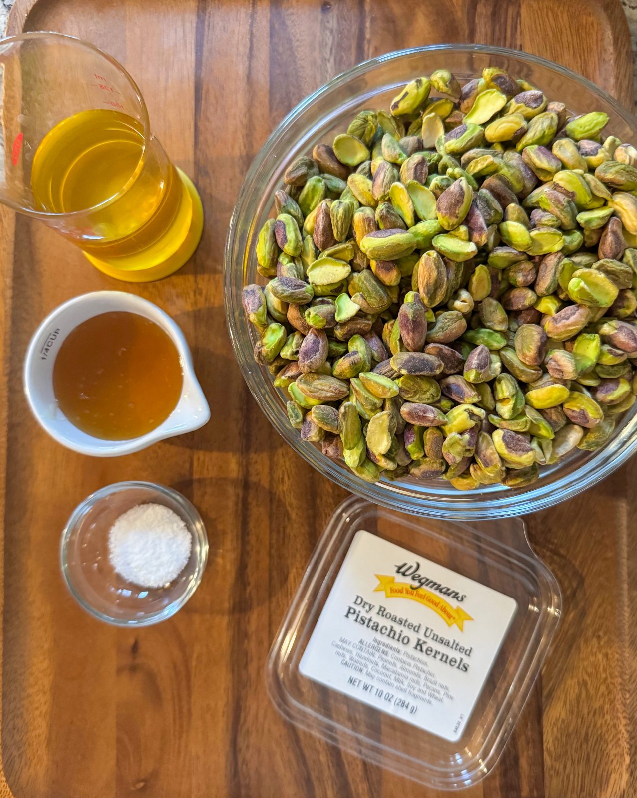 oil, salt, honey and a lid showing the pistachios were from Wegmans and are dry roasted and unsalted.